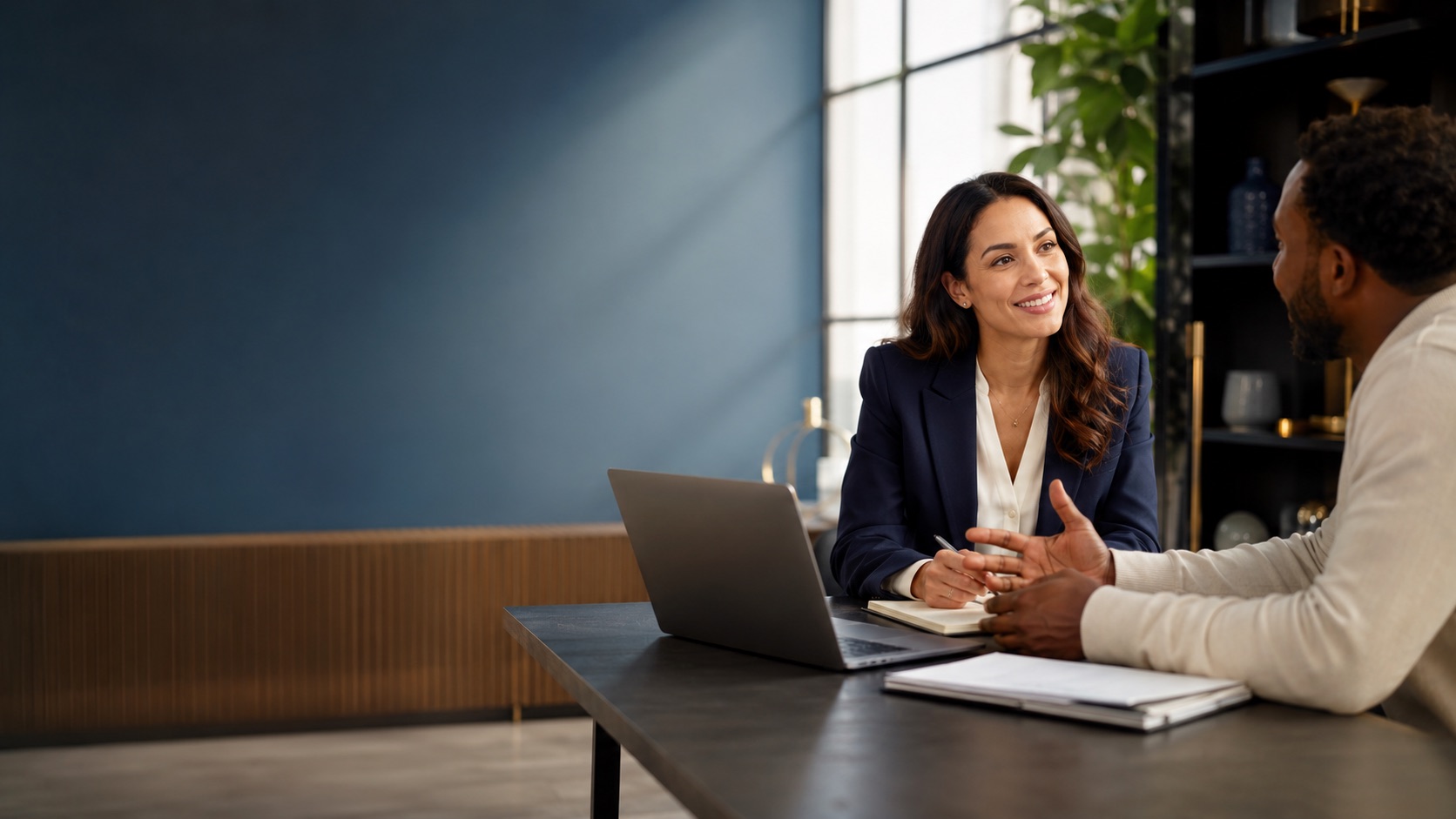 An accounting professional reviewing business finances with a client